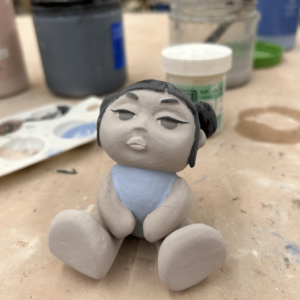 clay figure of baby doll