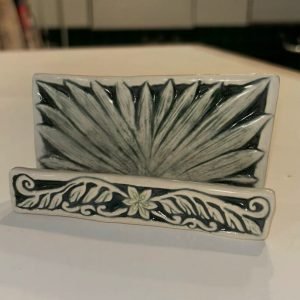 Buisness card holder made of ceramics with etchings of the national flower of El Salvador - Flor de Izote.